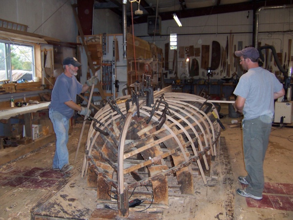 The backbone is setup on the Beetle Cat mold (which all Beetles have been built on since 1946!). The white oak ribs are then steamed and bent on.