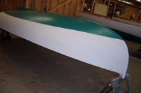 The waterline is scribed and the interior and exterior of the hull are primed with paint.